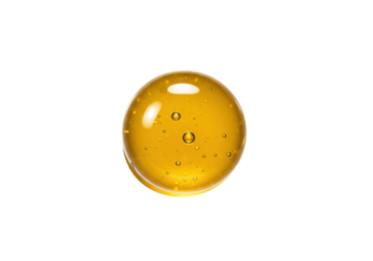A perfectly spherical, glossy, viscous golden yellow liquid blob with subtle internal air bubbles, isolated on a transparent background in a high-key studio macro shot, concept of concentrated essence