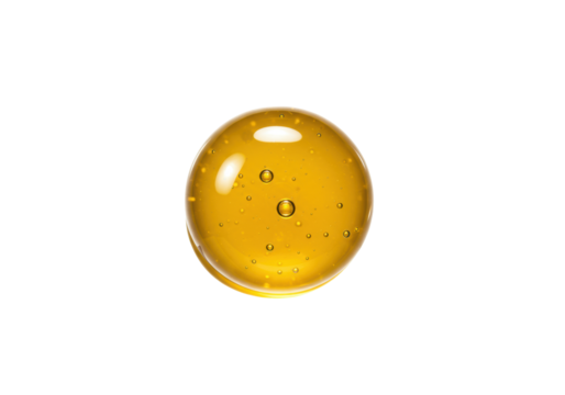 A perfectly spherical, glossy, viscous golden yellow liquid blob with subtle internal air bubbles, isolated on a transparent background in a high-key studio macro shot, concept of concentrated essence