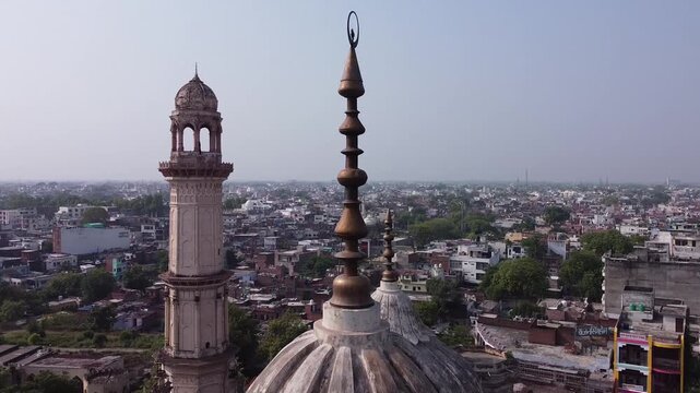 Aerial view of a mosque surrounded by mall houses in lucknow