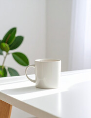 Obraz premium Plain ceramic coffee mug mockup on white table, front view, soft natural light with gentle shadows, minimal clean background, realistic glossy surface, no logo or design.
