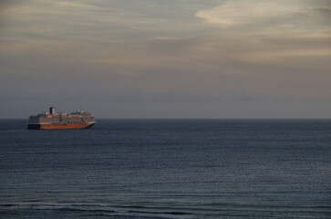 Modern luxury cruiseship cruise ship liner Koningsdam, Nieuw Statendam or Rotterdam in port of Oranjestad, Aruba ABC Islands tropical paradise during Caribbean dream vacation cruising