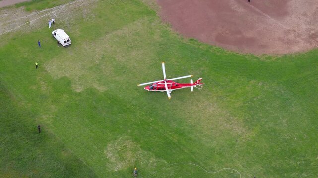 Emergency helicopter landed in a field 