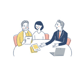 パンフレットを見ながら相談をする夫婦と接客をする担当者