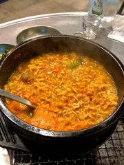 Shin Ramyun,close up of Ramyeon or Ramyun is a Korean-style soup noodle dish with a spicy flavor. Ramyeon or Korean instant noodles with egg - Korean food style