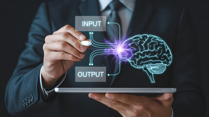Businessman diagrams input output process influencing brain activity with digital technology