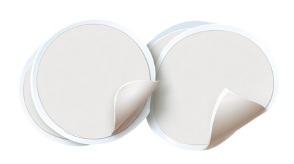 Two overlapping blank stickers with curled edges