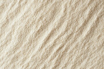 Beige powder background with soft texture, fine particles and subtle shadows for baking
