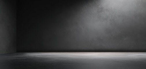 The dark minimalist studio space with soft lighting and smooth floor