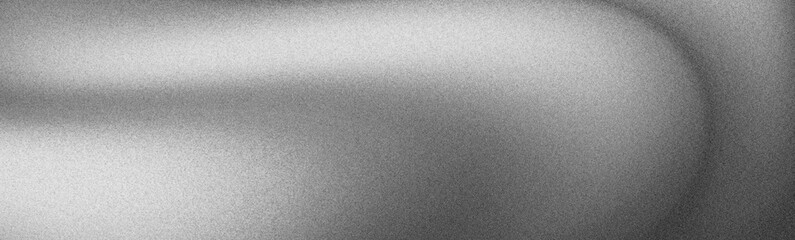 Abstract grayscale image with subtle light and shadow creating a curved shape.