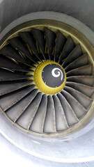 Close-Up View of Jet Engine with Spiral Fan Blade and Precision Metalwork