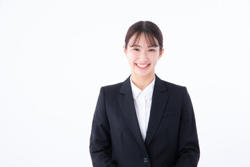 笑顔のスーツを着た若い女性