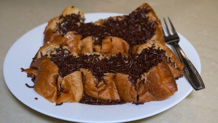 Sweet Bread with Chocolate Sprinkles on Plate
