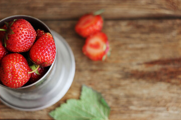 Strawberries in a metal bucket