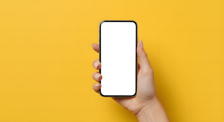 Hand holding smartphone with blank white screen, isolated on bright yellow background, copy space for app design.
