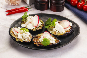 Grilled eggplant with cheese and radish