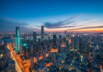 Obraz premium Hong kong cityscape at night with illuminated skyscrapers and traffic
