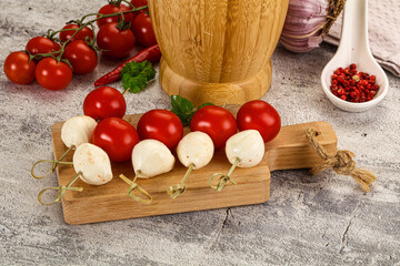 Mozzarella with cherry tomato canape
