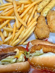 A classic combination of a juicy burger with fresh toppings served alongside golden, crispy French...