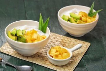 Es teler is an Indonesian fruit cocktail. Avocado, coconut meat, grass jelly, jackfruit and other fruits are served with coconut milk, sweetened condensed milk, and sugar