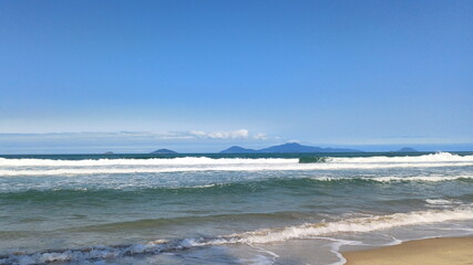 blue water in the ocean with white waves