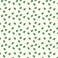 Scattered green leaves on cream seamless repeat