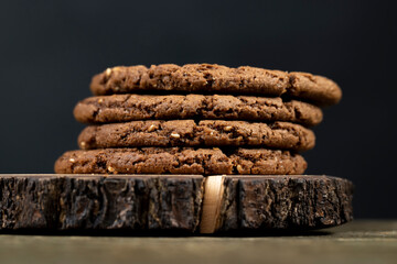 round chocolate biscuits with white sesame seeds and cocoa powder