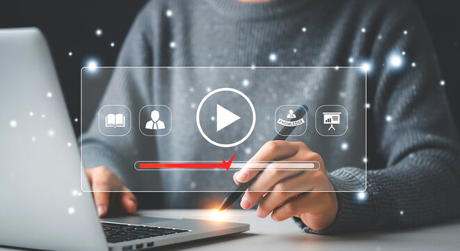 Person using a laptop with a digital interface showing a video player and educational icons overlayed