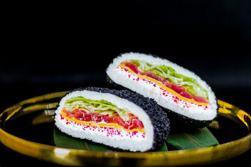 Sushi burger with salmon, avocado, and rice bun, creative Japanese fusion food