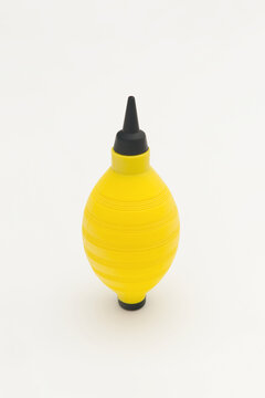 yellow blower isolated on white background