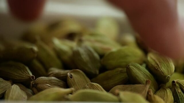 cardamom pods in a bowl