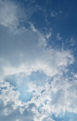 It's a blue sky with fluffy clouds.