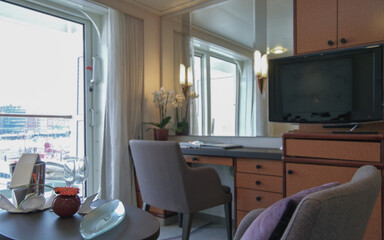 Luxurious suite stateroom cabin room onboard luxury yacht cruise ship cruiseship liner with bedroom...