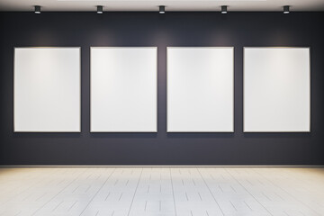 Modern art gallery interior with four blank vertical frames on dark wall under spotlights in clean exhibition room. 3D Rendering. 3D Rendering