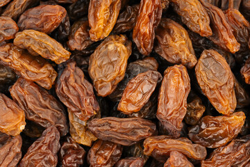 Raisins on a white background. Dried grapes.	