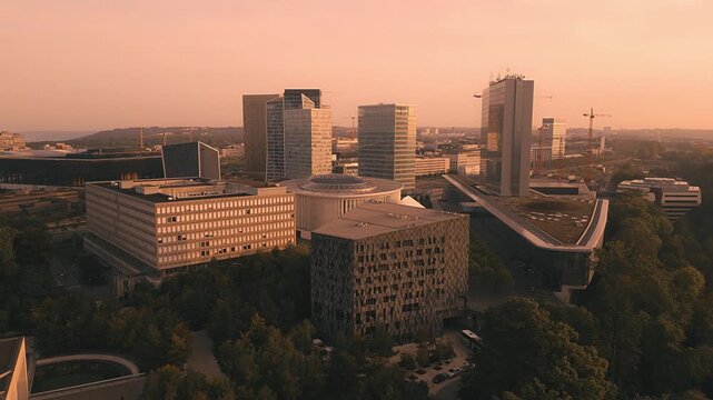 Drone footage of golden red sky of Kirchberg in Luxembourg