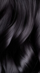 Silky smooth black hair with soft waves and shiny texture, showcasing healthy and well maintained long hair with natural gloss and volume
