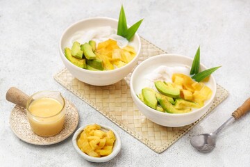 Es teler is an Indonesian fruit cocktail. Avocado, coconut meat, grass jelly, jackfruit and other fruits are served with coconut milk, sweetened condensed milk, and sugar