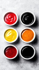 Colorful sauces white bowls gray surface, vibrant condiments with smooth texture, perfect for enhancing meals with rich flavors and appetizing