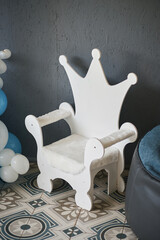 Vertical photo of a chair during a birthday celebration