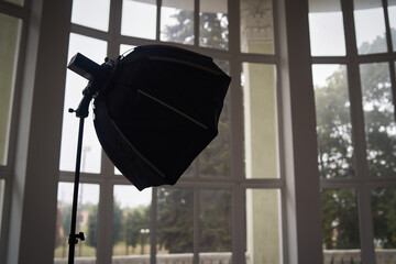 Photo flash against the background of the windows in the lobby