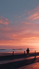 Fototapeta premium Evening jogger along the beach promenade at sunset with colorful clouds and gentle waves