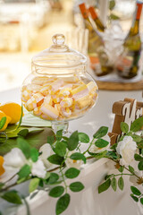 table setting with flowers and marshmallows 