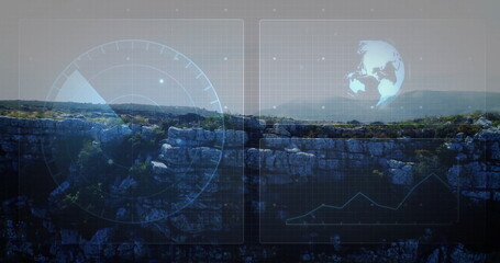 Displaying rugged cliff formation at canyon, with radar, grid, 3D globe, graph and data nodes