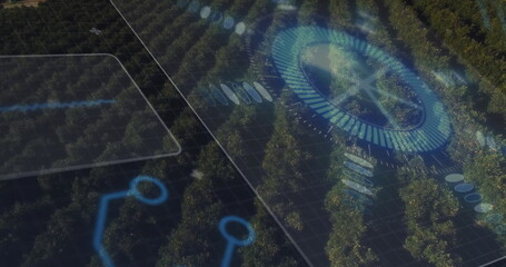 Showing aerial orchard rows receiving precision monitoring in grove, with holographic data overlay
