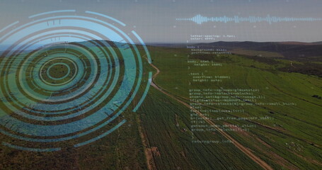 Futuristic blue HUD overlaying farmland with dirt track and code waveform overlays, copy space