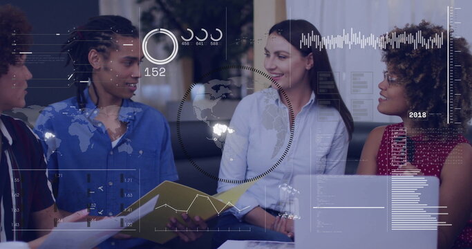 Discussing group of four coworkers using laptop and documents in office lounge, with data overlays