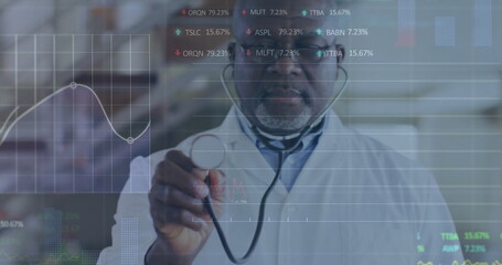 Holding doctor wearing lab coat in hospital corridor showing stethoscope data overlays