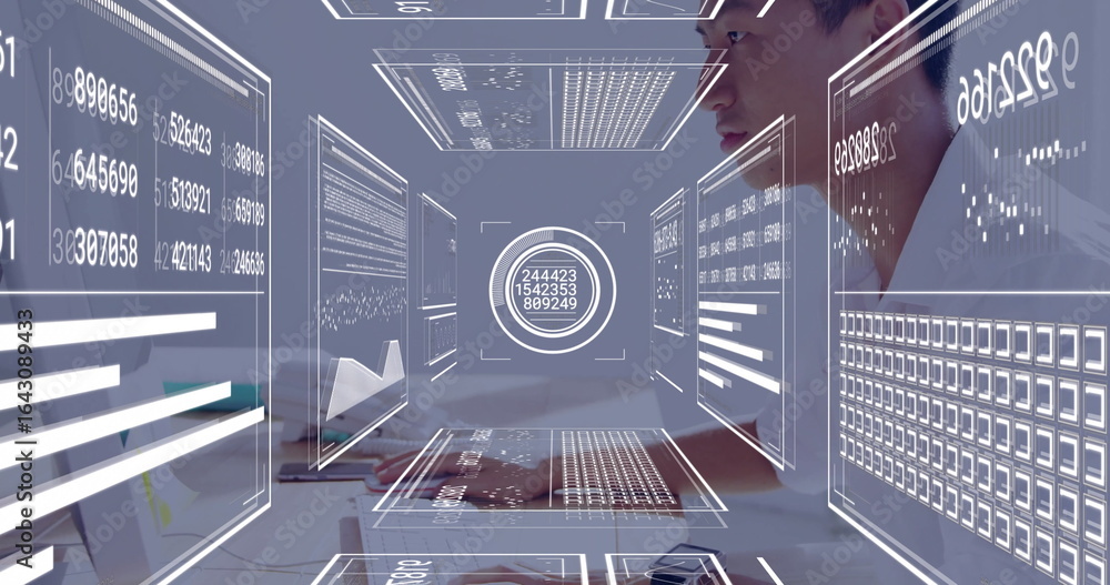 Poster typing asian analyst processing holographic data panels at desk with keyboard and mouse, copy space