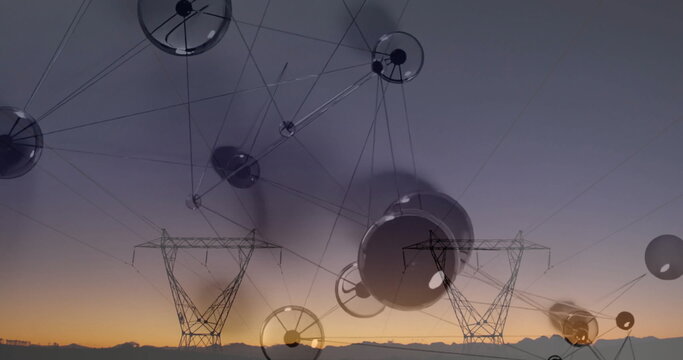 High-voltage transmission towers standing on rural plain at dusk, with spheres and lines overlay