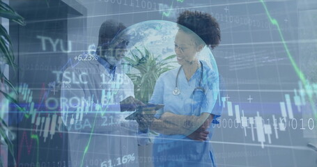 Healthcare team examining digital tablet in clinic corridor, with stethoscope and chart overlay